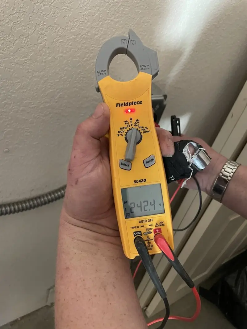 Voltage testing with clamp meter during Aluminum Wiring Replacement in Laurel
